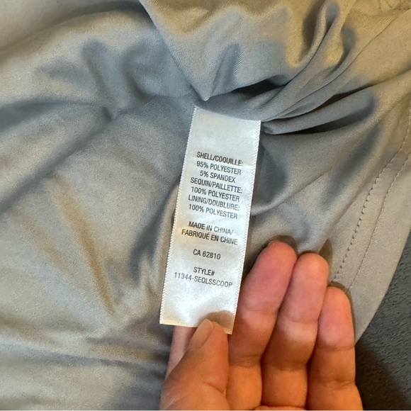 Ricki's Silver Sequin Long Sleeve Blouse

#1039 - Picture 6 of 7